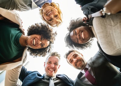 Delighted customers smile in a circle
