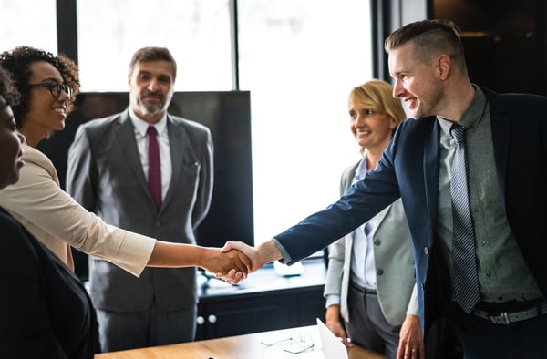 Shaking hands business meeting